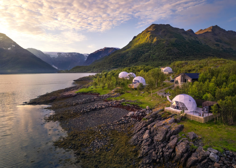 Stay in one of the geodesic domes on the foot of the Oksfjordjøkel glacier. Photo: Isbreen The Glacier